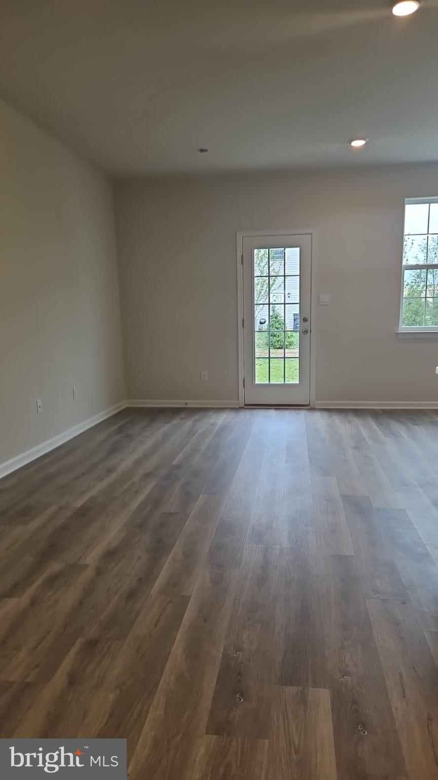 30 Elliot Lane Westampton, NJ 08060 - Photo 14 of 96 an empty room with wooden floor and windows