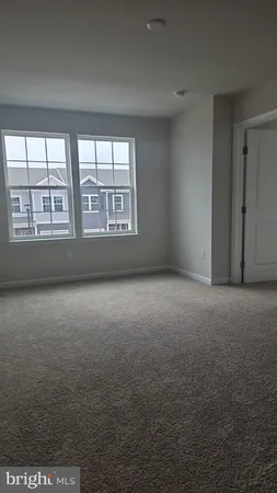 a view of a field with an outdoor space