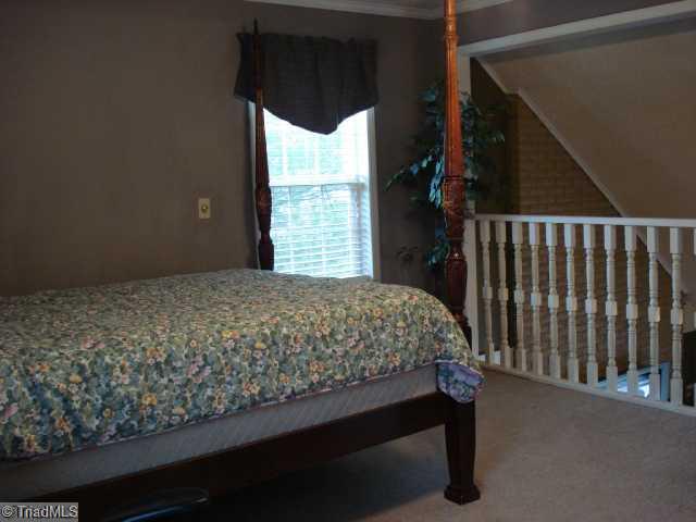 534 Wildlife Road Lexington, NC 27292 - Photo 11 of 16 3rd Bedroom. 3rd bedroom is loft, overlooking livingroom
