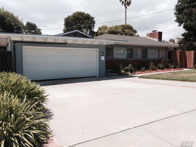 519 Las Colindas Road San Rafael, CA 94903 - Photo 1 of 1 a front view of a house with a yard