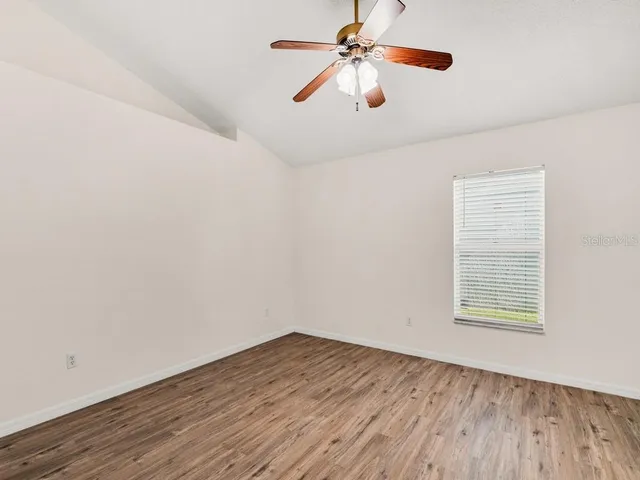 a bathroom with a sink double vanity and a mirror