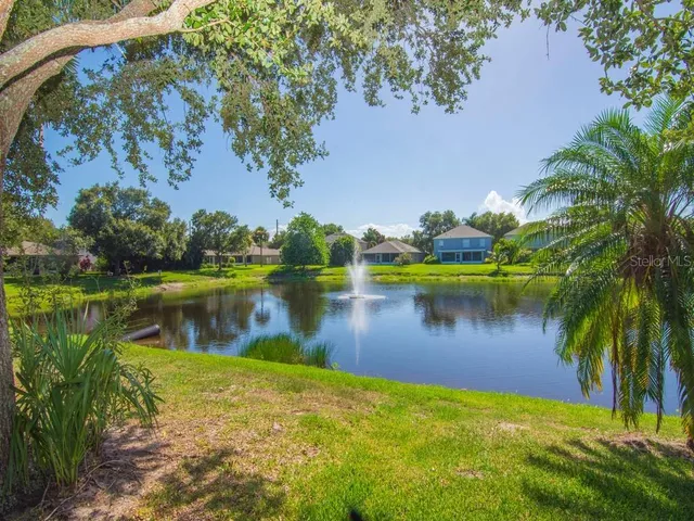 a view of a porch with a floor to ceiling windows