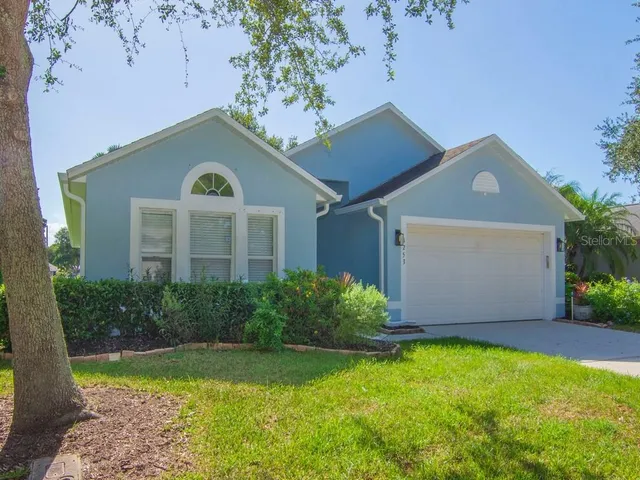 a view of a swimming pool with a patio
