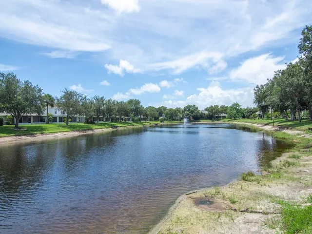 a view of a house with a big yard