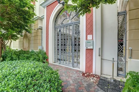 a view of a living room and a floor to ceiling window