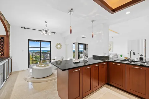 a kitchen with a sink and stove