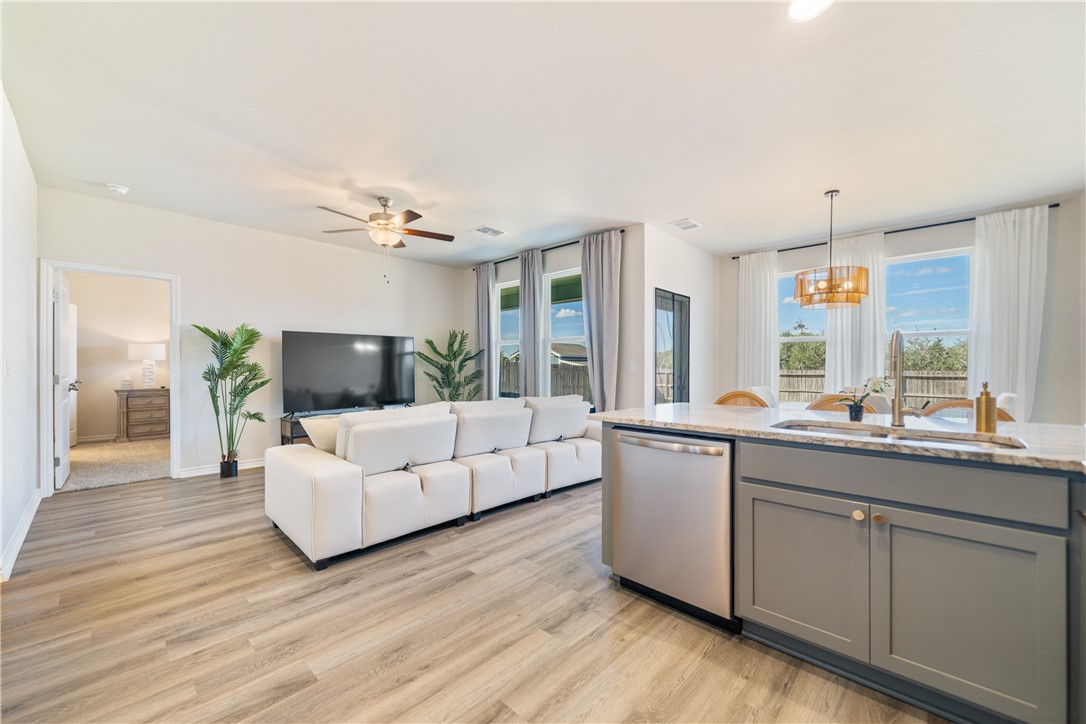 1906 Shellbank Avenue Aransas Pass, TX 78336 - Photo 10 of 27 a living room with furniture and a flat screen tv