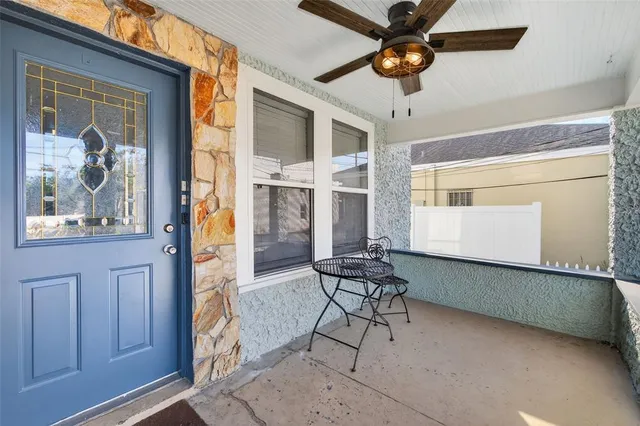 a bathroom with a bathtub and a toilet