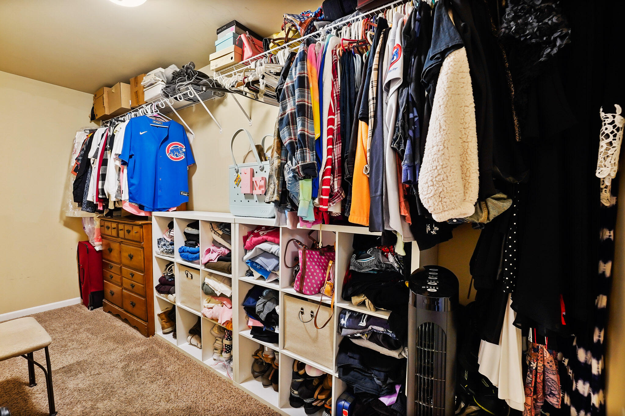 17266 Independence Drive Lowell, IN 46356 - Photo 13 of 28 a view of walk in closet with clothes and shoes