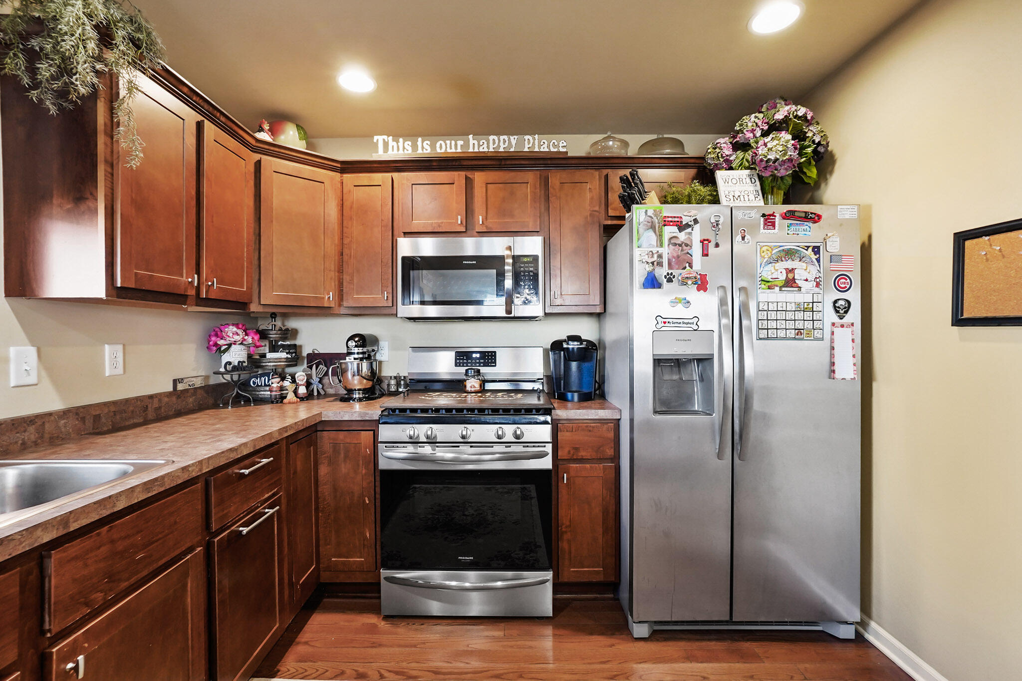 17266 Independence Drive Lowell, IN 46356 - Photo 17 of 28 a kitchen with stainless steel appliances granite countertop a refrigerator sink and microwave
