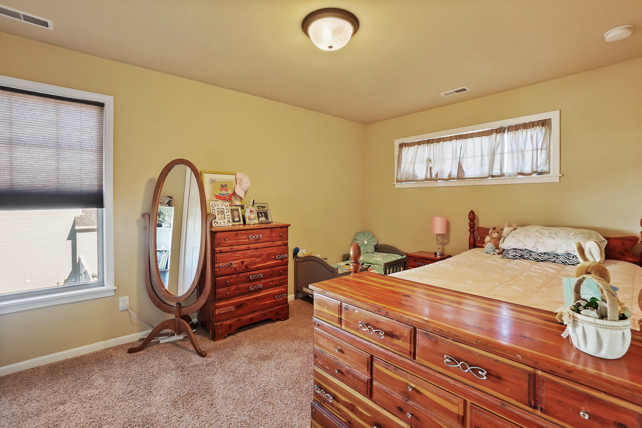 17266 Independence Drive Lowell, IN 46356 - Photo 25 of 28 a bedroom with a bed and a dresser