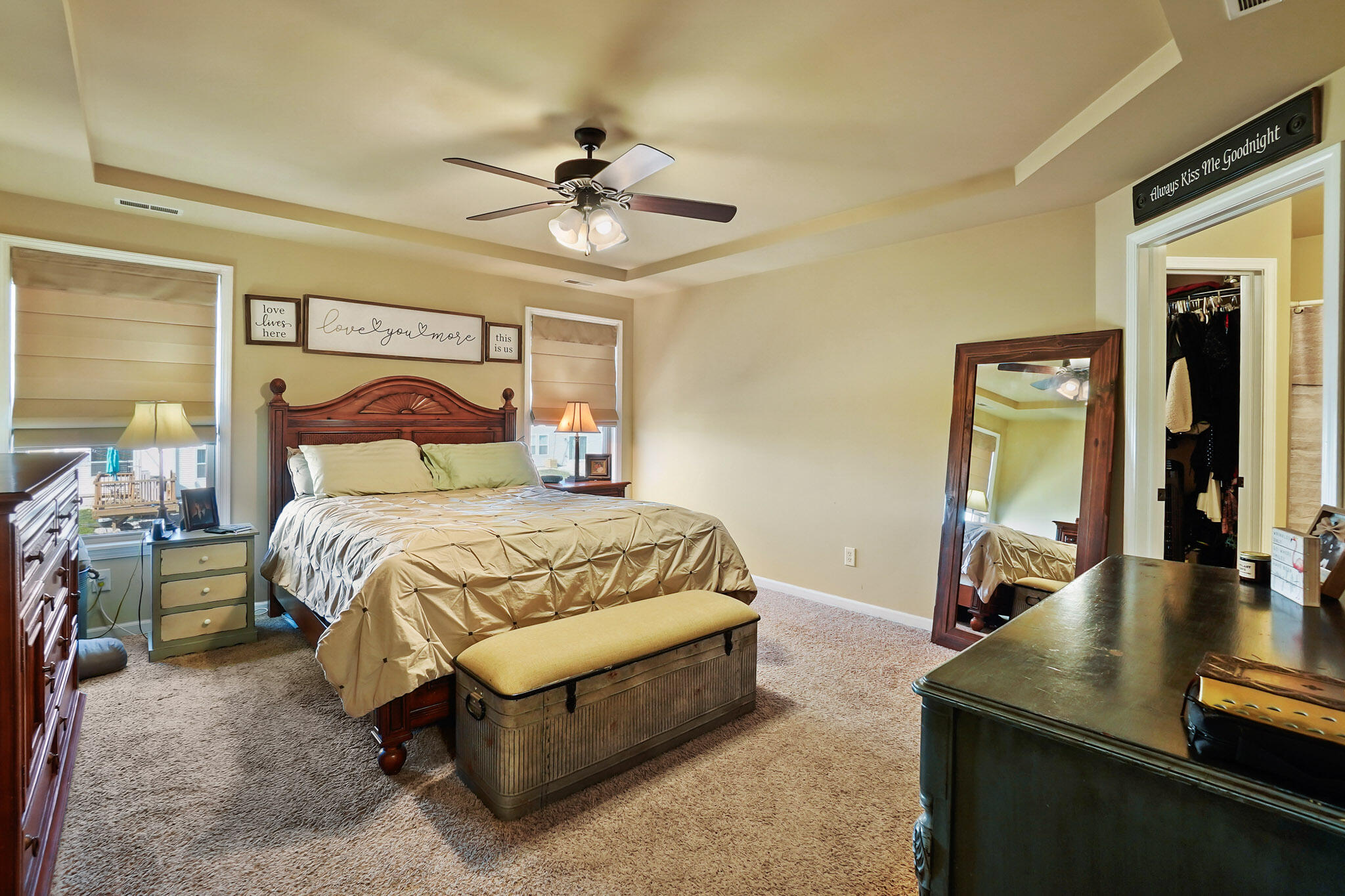 17266 Independence Drive Lowell, IN 46356 - Photo 26 of 28 a bedroom with a bed a mirror and a large window