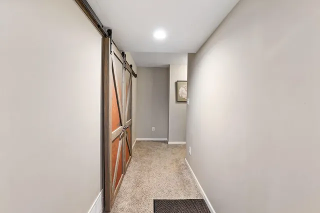 a view of hallway with stairs