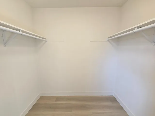 a view of an empty walk in closet