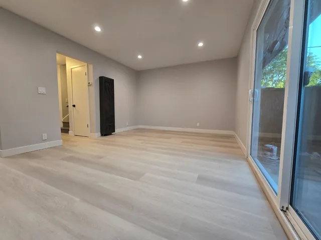 a view of hallway with a large window