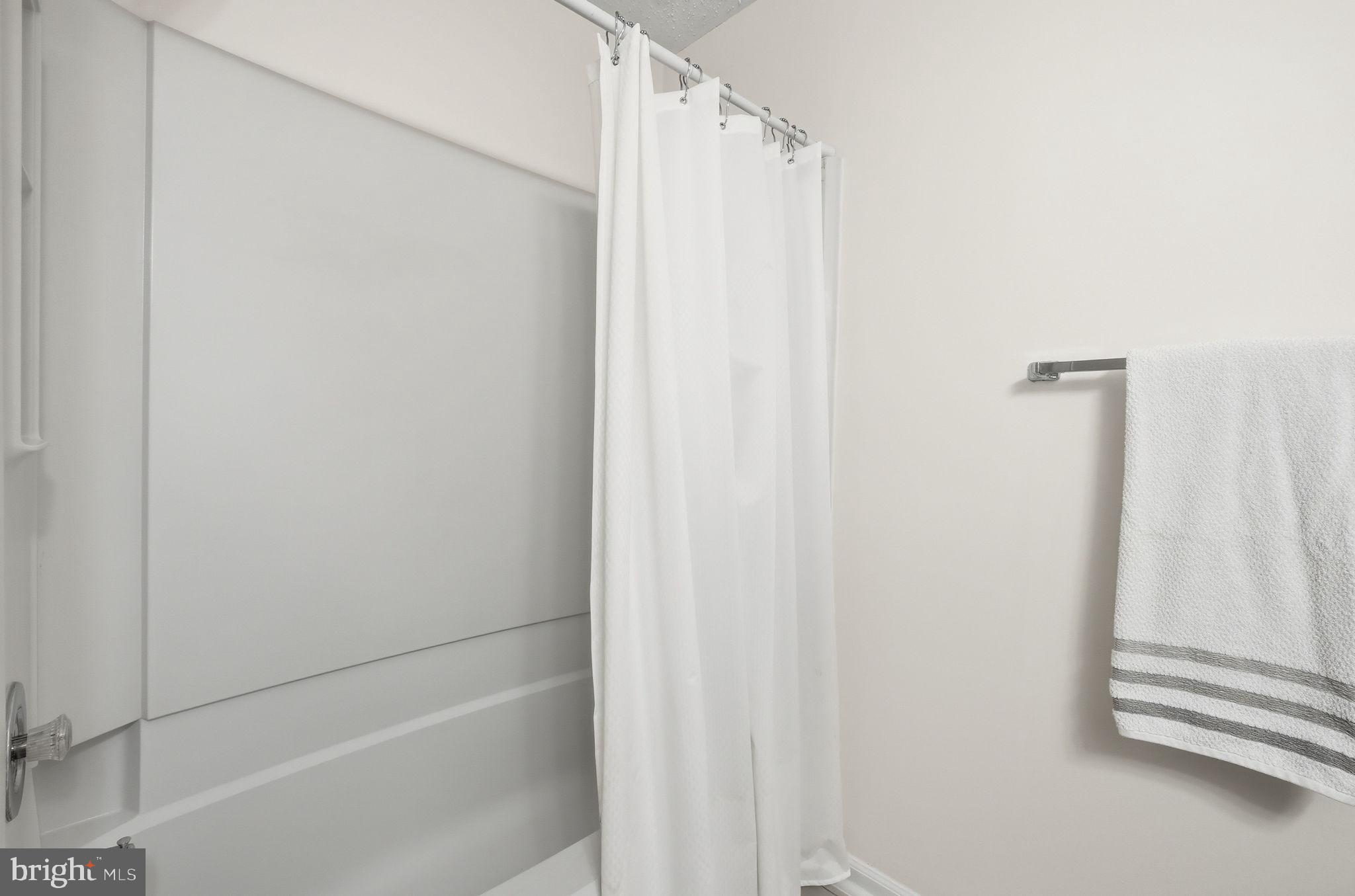 2316 Glade Bank Way Reston, VA 20191 - Photo 14 of 26 a bathroom with a shower