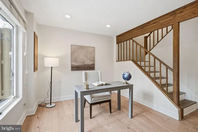 a bathroom with a sink a vanity and a mirror