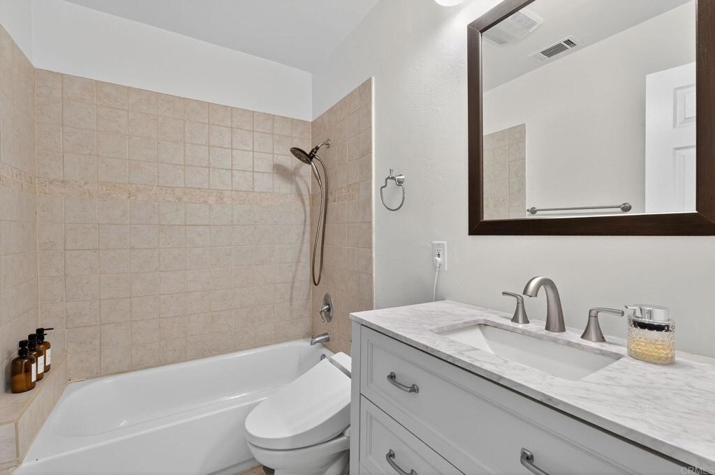 2930 Copley Avenue San Diego, CA 92116 - Photo 15 of 32 Bathroom on main level right off living room/kitchen/dining