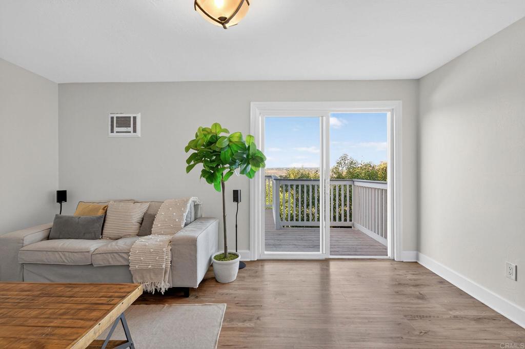 2930 Copley Avenue San Diego, CA 92116 - Photo 27 of 32 Bonus living room or family room. Has a patio and deck access giving it lots of versatility