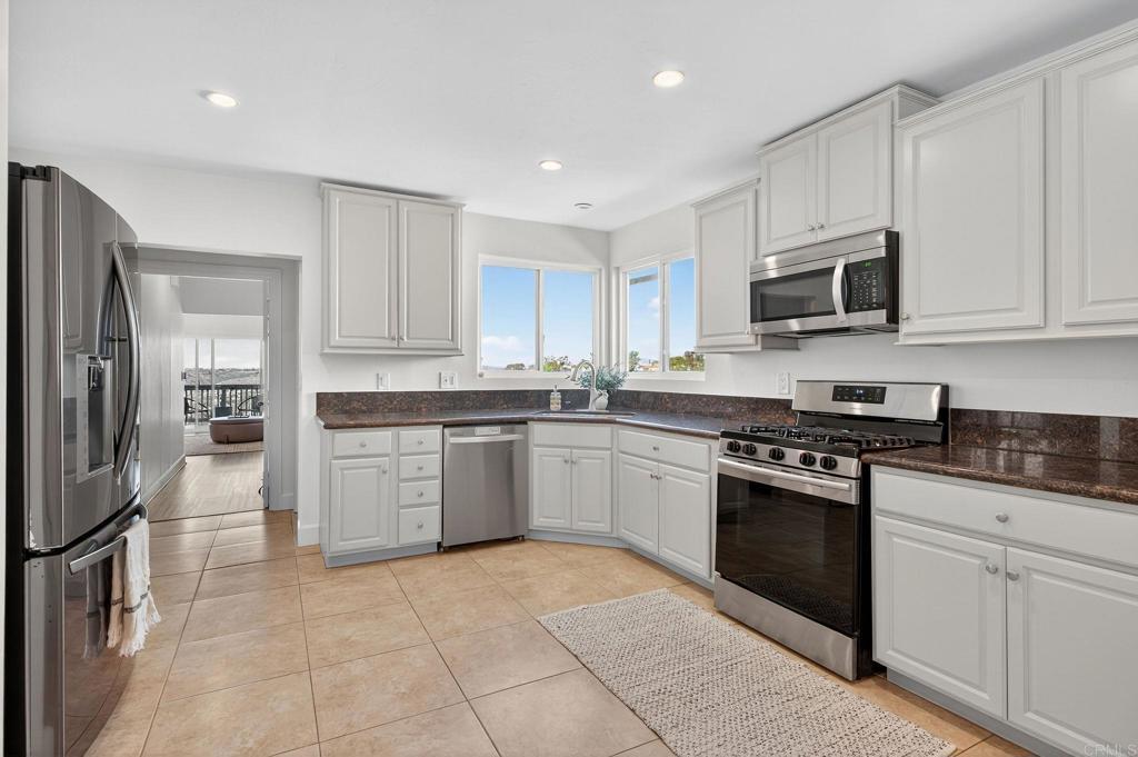 2930 Copley Avenue San Diego, CA 92116 - Photo 3 of 32 Nice light and bright, enjoy the view and easy access to the laundry room and pantry.