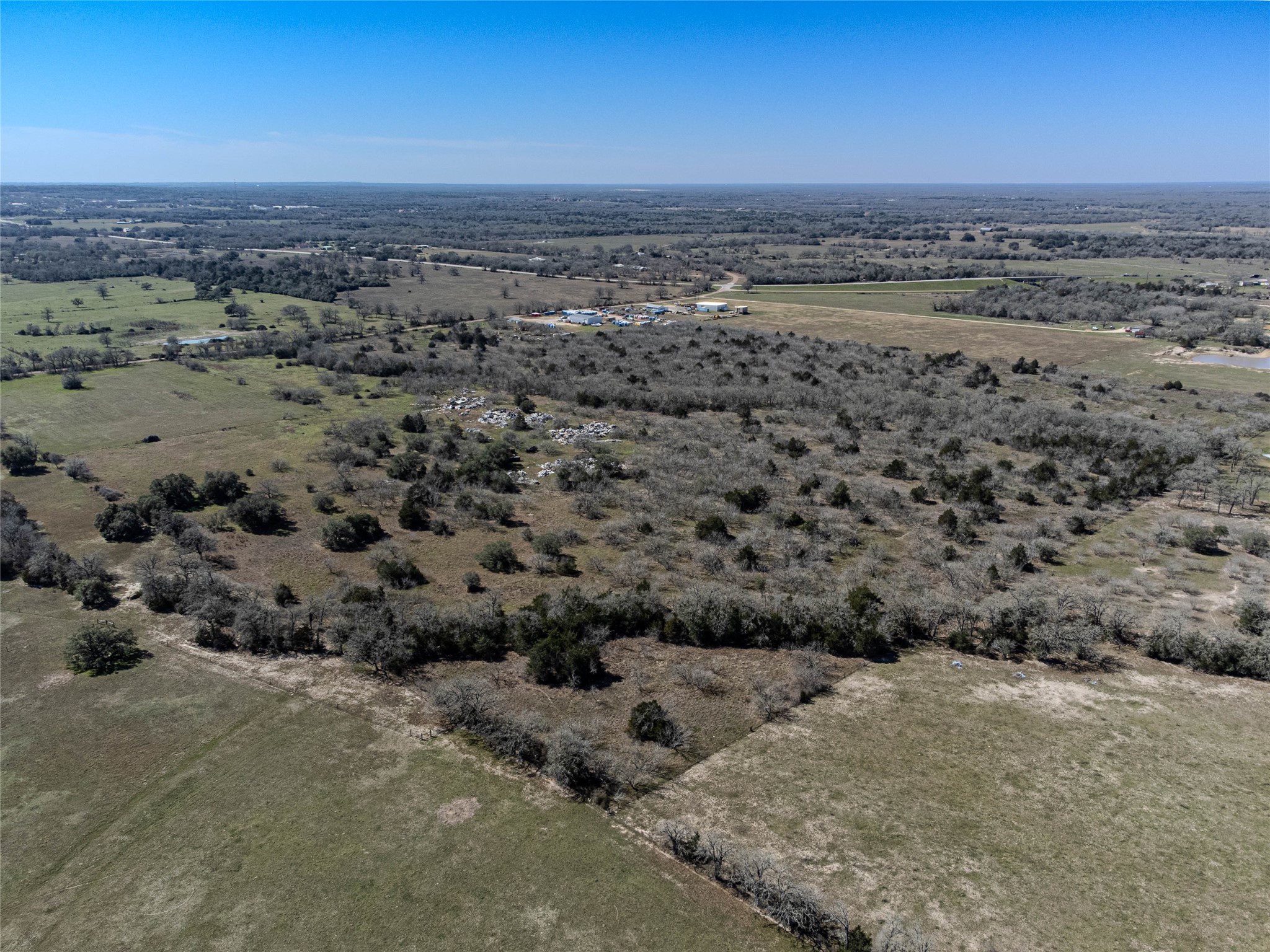 Nikel-mica Rd Flatonia Tx 78941 Road Flatonia, TX 78941 - Photo 8 of 19 a view of a dry yard