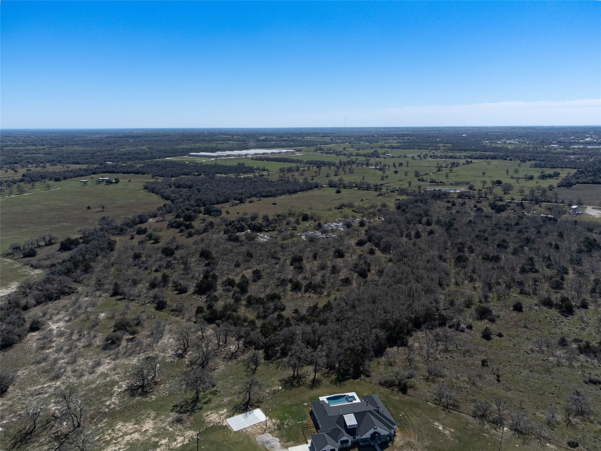 Nikel-mica Rd Flatonia Tx 78941 Road Flatonia, TX 78941 - Photo 9 of 19 an aerial view of a house with a yard