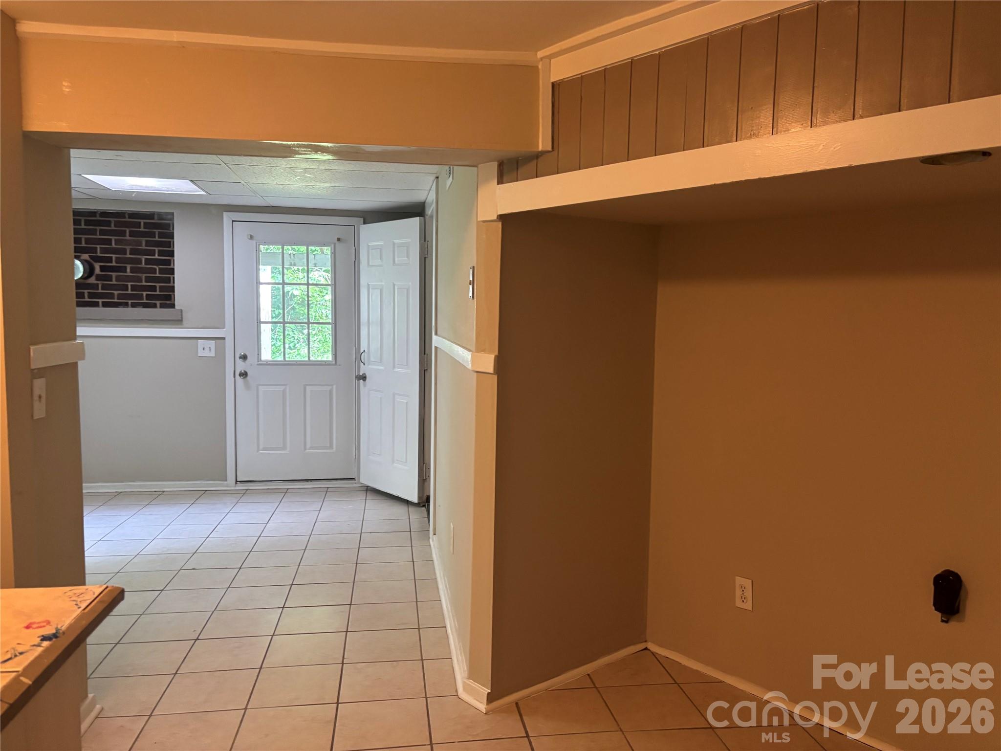 975 Old Charlotte Road Southwest Concord, NC 28027 - Photo 17 of 28 a view of an empty room with a kitchen
