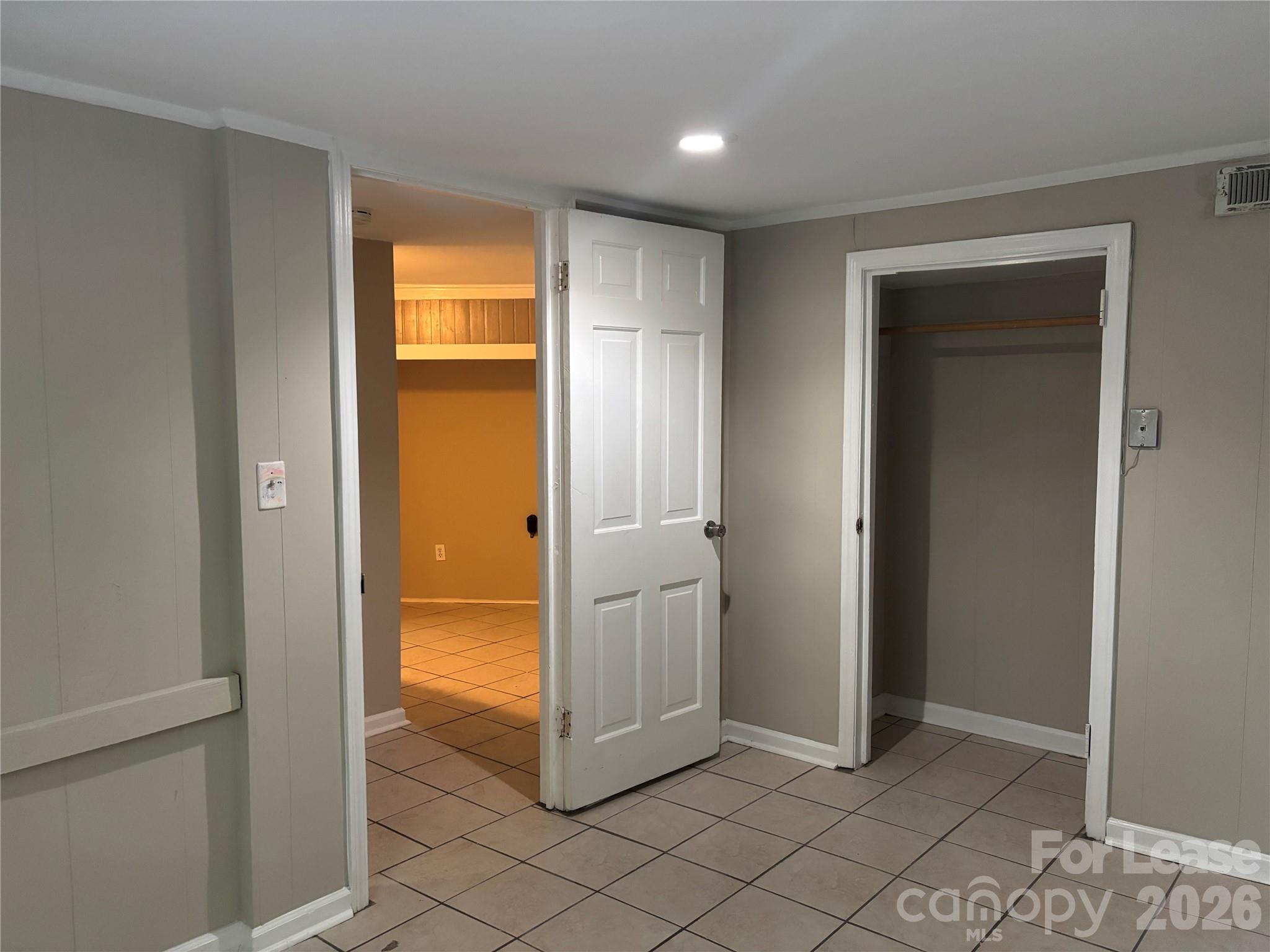975 Old Charlotte Road Southwest Concord, NC 28027 - Photo 20 of 28 a view of a room with door