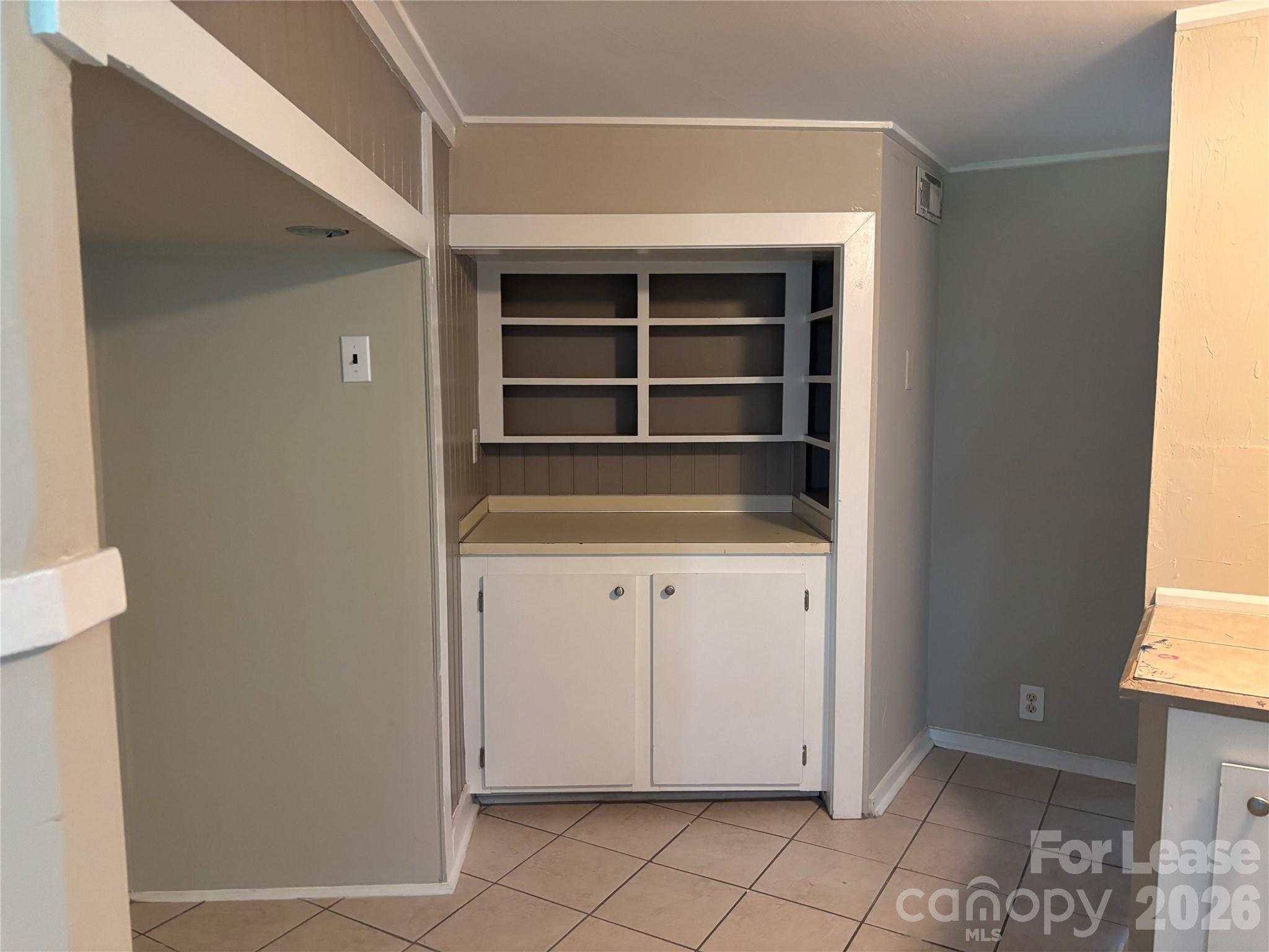 975 Old Charlotte Road Southwest Concord, NC 28027 - Photo 22 of 28 a view of cabinets and window