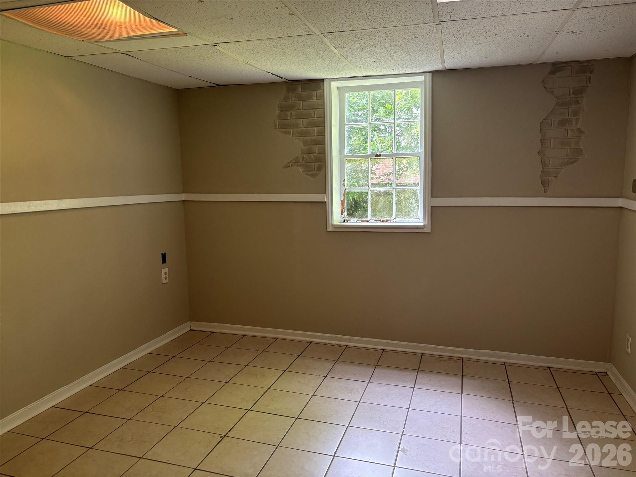 975 Old Charlotte Road Southwest Concord, NC 28027 - Photo 24 of 28 a view of a room with a window