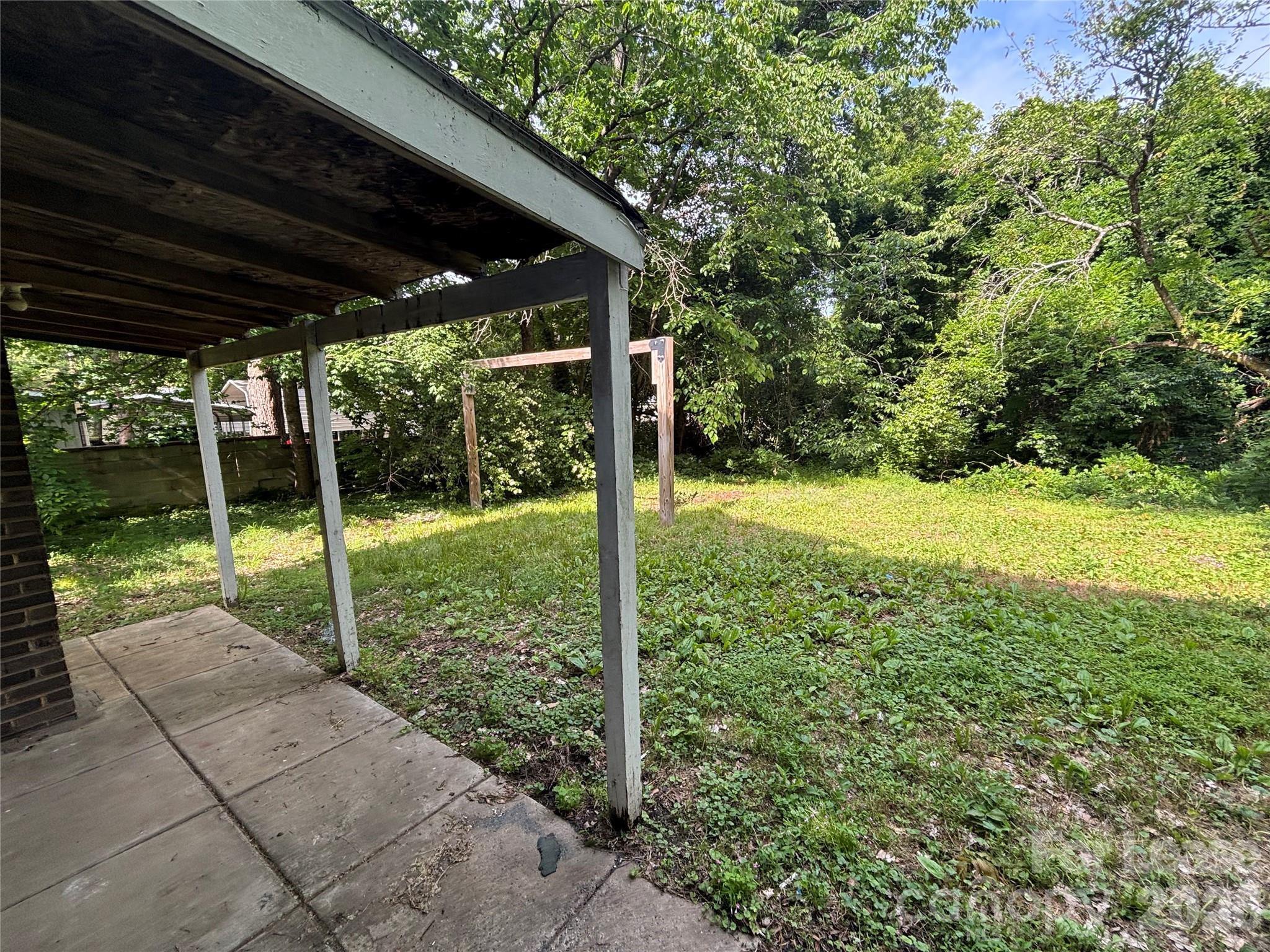 975 Old Charlotte Road Southwest Concord, NC 28027 - Photo 27 of 28 a view of backyard with green space