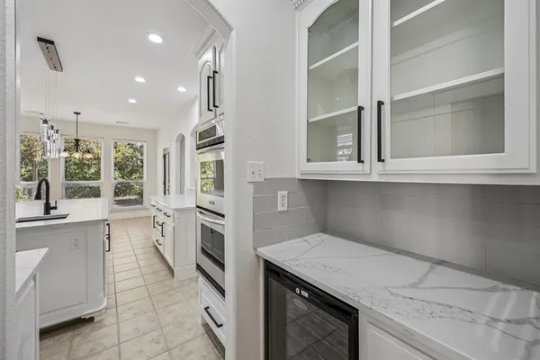 a view of kitchen and microwave