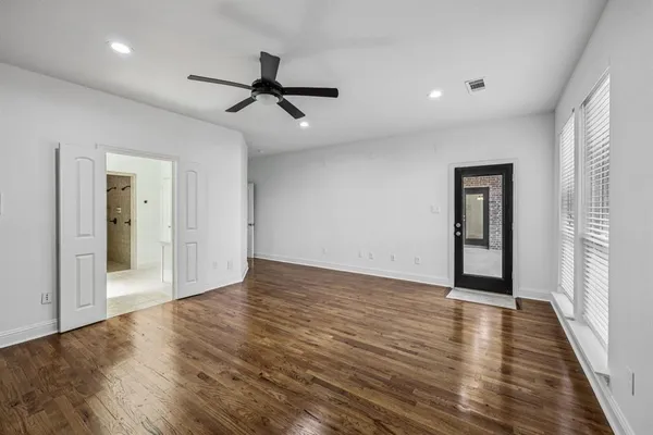 a bathroom with a double vanity sink and mirror