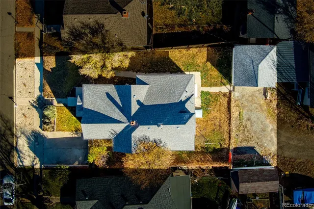 an aerial view of residential house and outdoor space