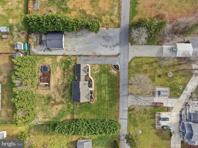 a sign that is on the side of a tree