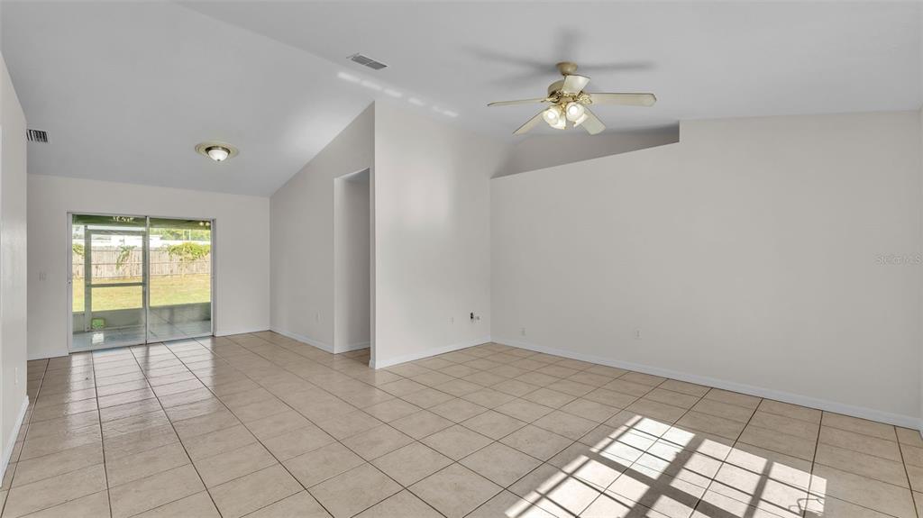 4515 Starfish Avenue Sebring, FL 33870 - Photo 13 of 38 a view of an empty room and window
