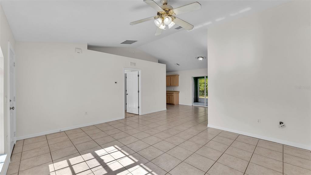 4515 Starfish Avenue Sebring, FL 33870 - Photo 15 of 38 a view of an empty room with a window
