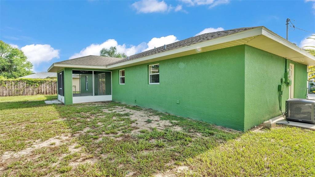 4515 Starfish Avenue Sebring, FL 33870 - Photo 36 of 38 a view of a house with a backyard
