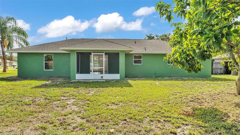 4515 Starfish Avenue Sebring, FL 33870 - Photo 37 of 38 front view of a house with a yard