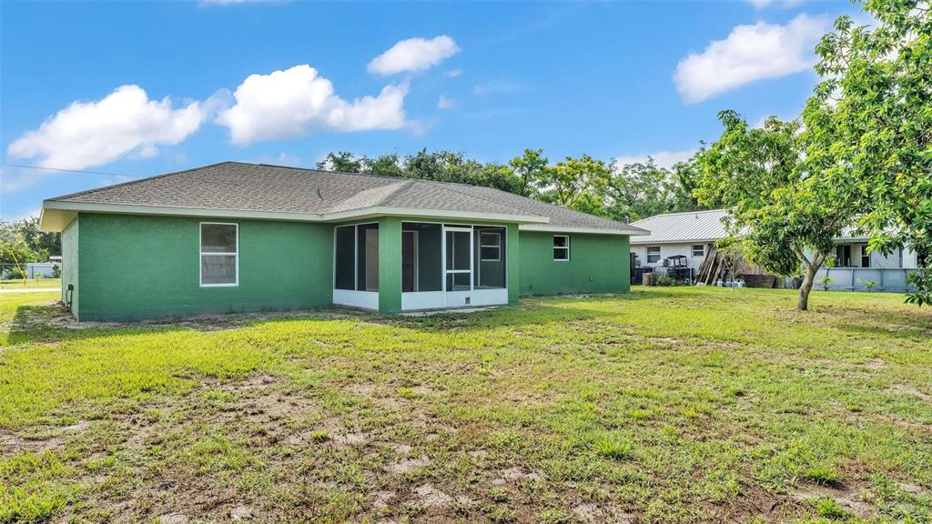 4515 Starfish Avenue Sebring, FL 33870 - Photo 38 of 38 a view of a house with a yard