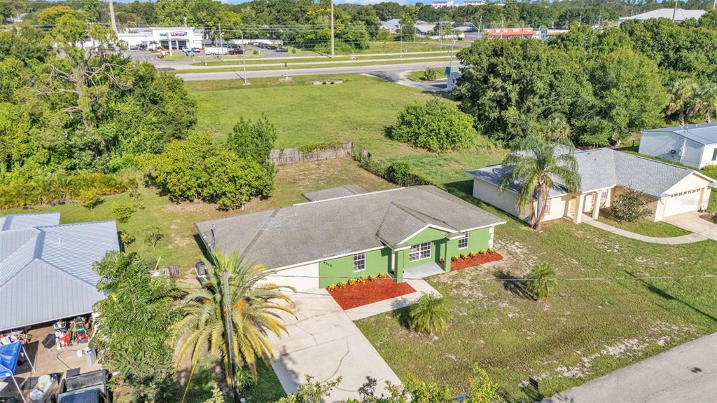 4515 Starfish Avenue Sebring, FL 33870 - Photo 4 of 38 an aerial view of residential houses with outdoor space and lake view
