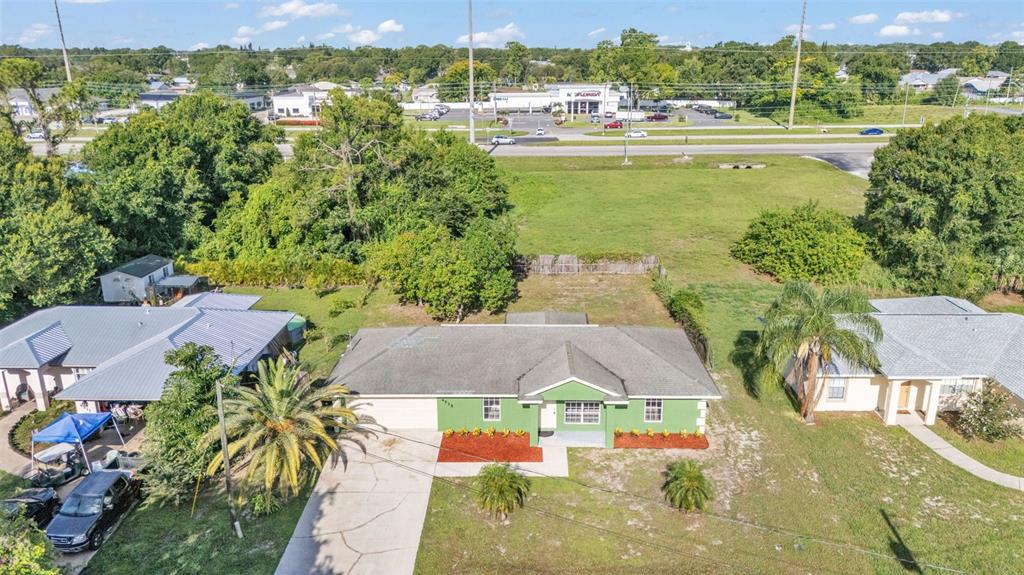 4515 Starfish Avenue Sebring, FL 33870 - Photo 5 of 38 an aerial view of residential houses with outdoor space and lake view