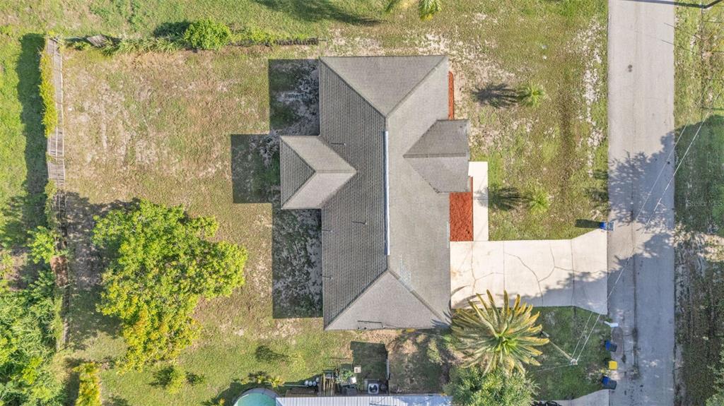 4515 Starfish Avenue Sebring, FL 33870 - Photo 10 of 38 an aerial view of a house with a yard