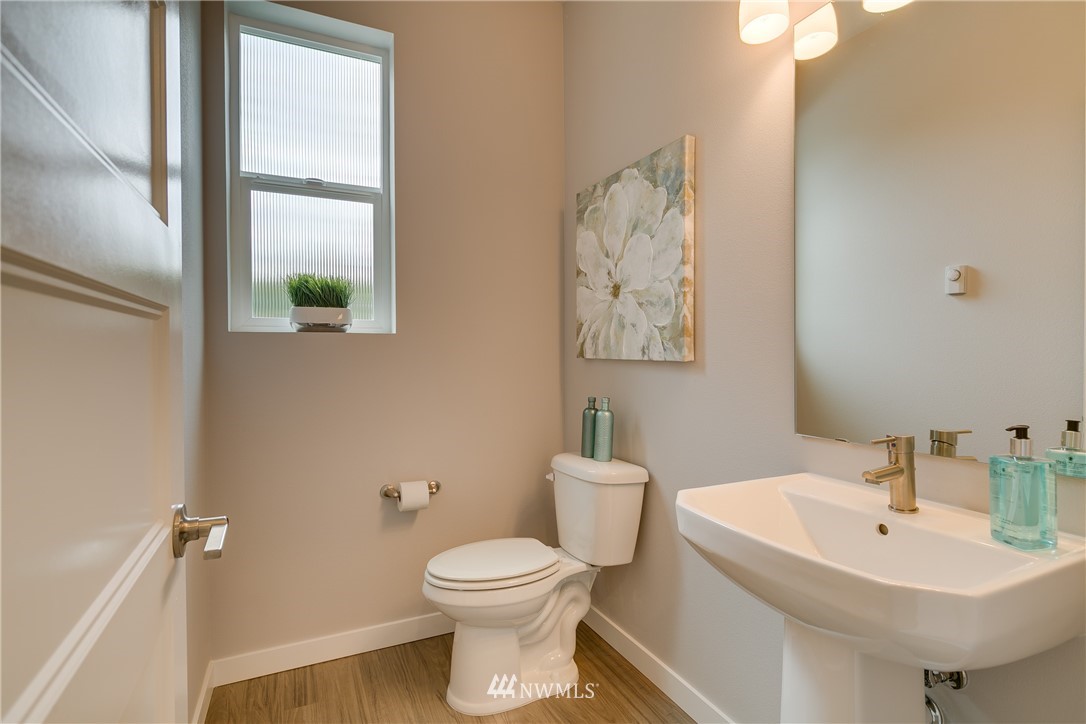 1225 Filbert Road, Unit F1 Lynnwood, WA 98036 - Photo 24 of 25 a bathroom with a sink and a toilet