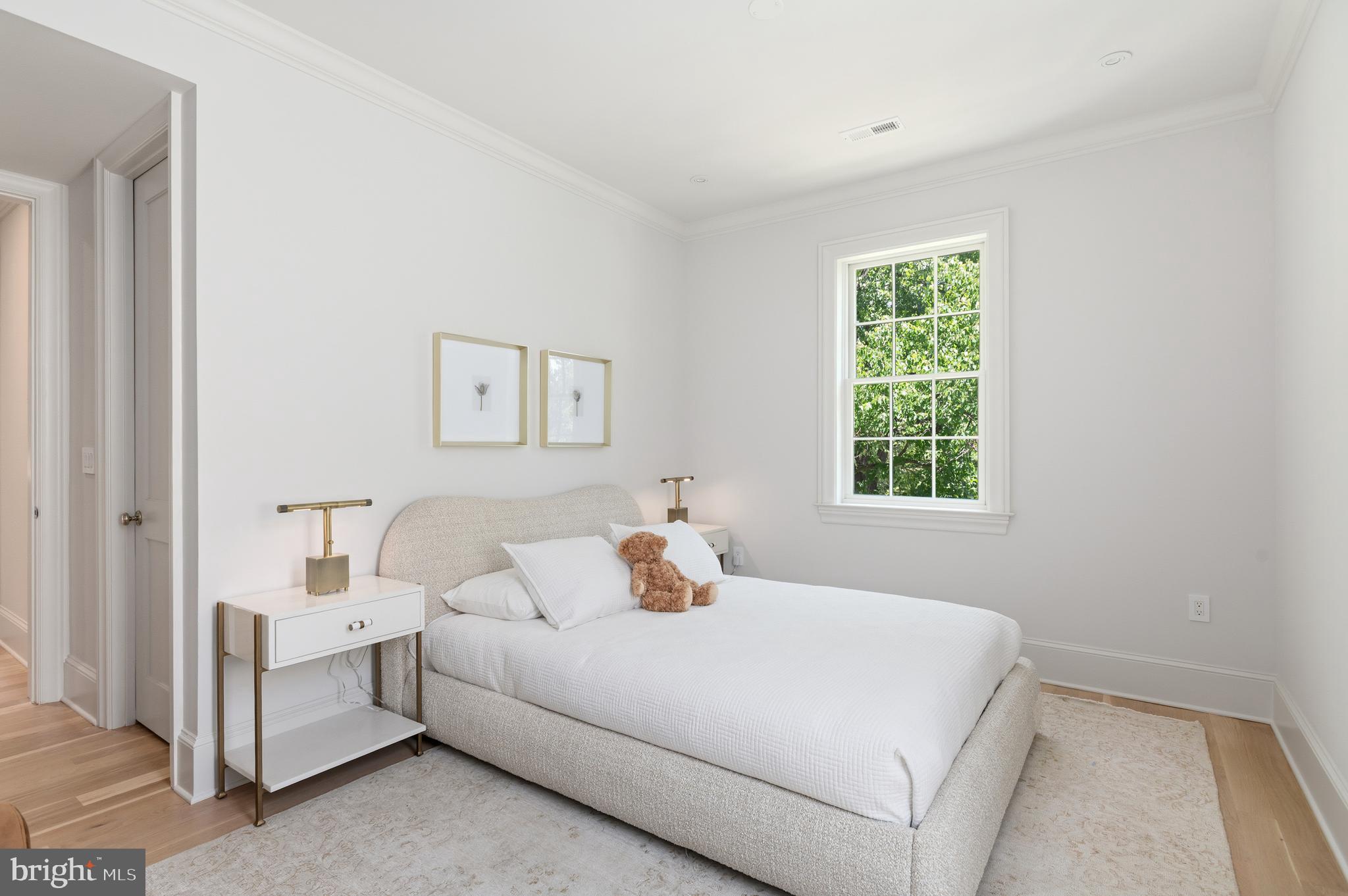 2604 36th Street Northwest Washington, DC 20007 - Photo 19 of 38 a bedroom with a bed and window
