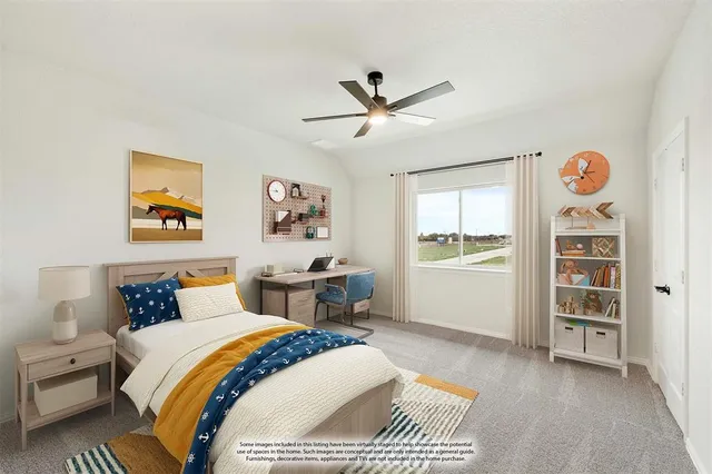 a bedroom with a bed and a cabinets