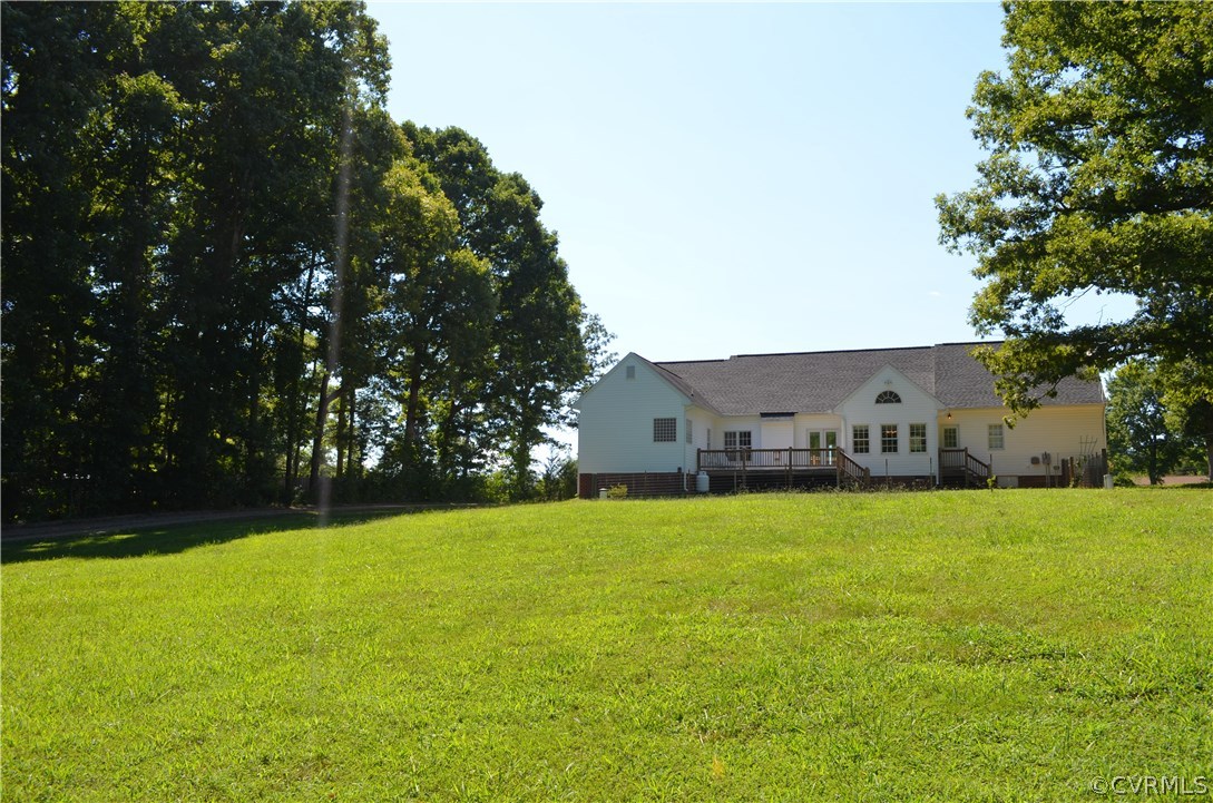 1006 Schroeder Road Powhatan, VA 23139 - Photo 2 of 30 Taken from the edge of the woods, this home has a