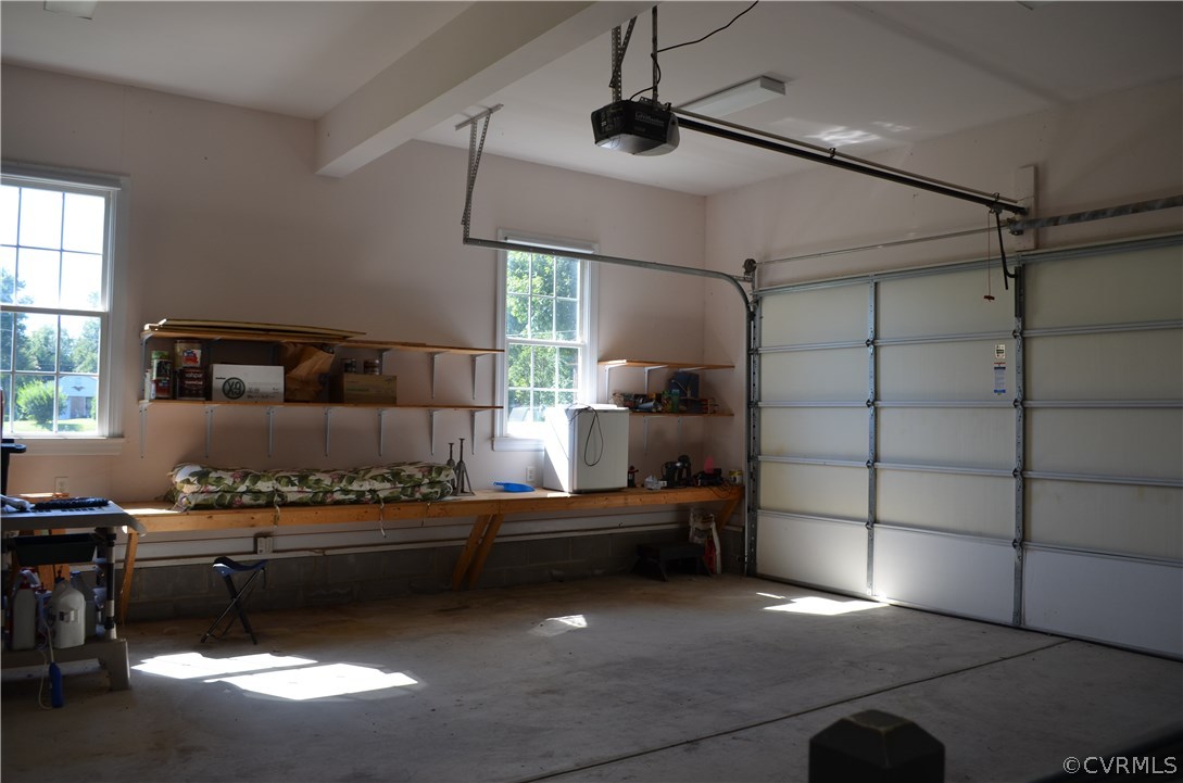 1006 Schroeder Road Powhatan, VA 23139 - Photo 21 of 30 Oversized garage measuring 27'3" x 23'4". Workben