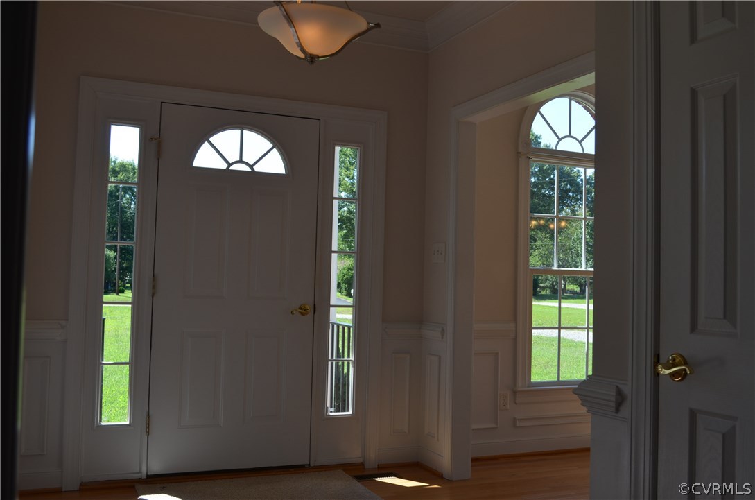 1006 Schroeder Road Powhatan, VA 23139 - Photo 3 of 30 Spacious foyer features triple crown moldings alon