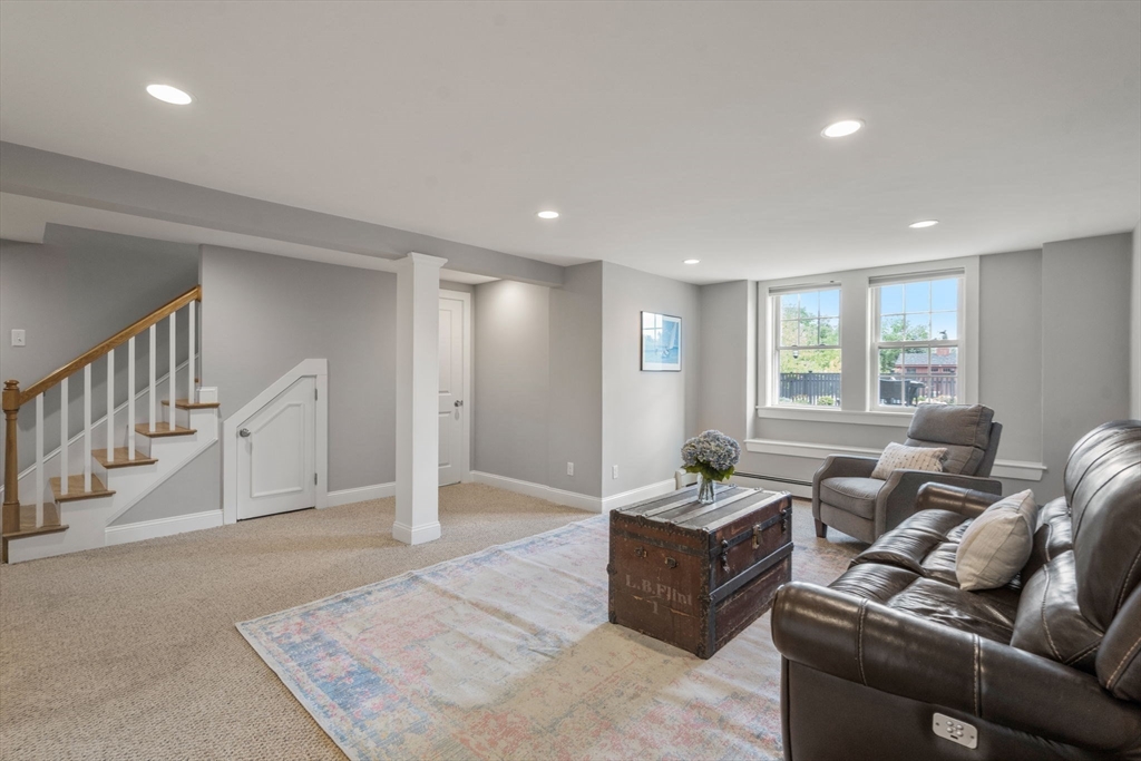 19 Main Street Dover, MA 02030 - Photo 23 of 41 a living room with furniture and a couch